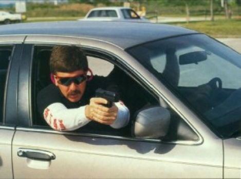 a picture of John Meyer, vehicle and shooting training at H&K